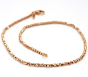 18K ROSE GOLD BRACELET WITH FINELY WORKED SPHERES, 1.5 MM DIAMOND CUT BALLS