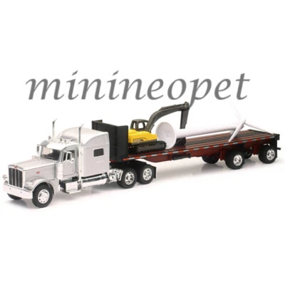 NEW RAY 10333B PETERBILT MODEL 389 WIND TURBINE & EXCAVATOR  TRUCKER 1/32 SILVER - Image 1 of 2