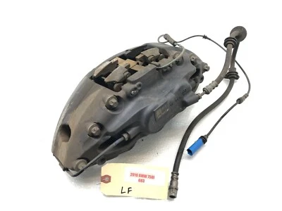 Pinza de freno delantera izquierda BMW 750I G12 2016-2019 con pastillas OEM. Foto 1 de 4