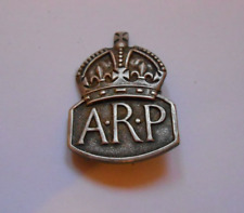 1939   second war era ARP AIR RAID PRECAUTIONS silver pin back badge