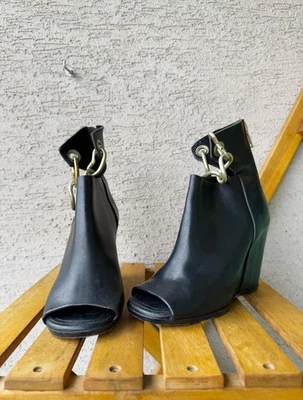 Botines de cuña Rick Owens de cuero negro con cadena Foto 1 de 4