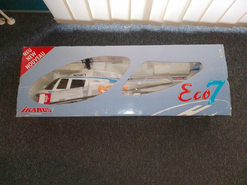 1 Ikarus ECO7 Bell Hubschrauber Helikopter + Ersatzteile Original Karton - Bild 1 von 4