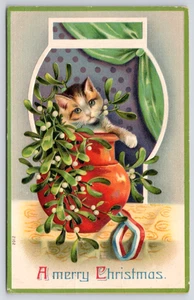 1911 Christmas Kitten in Vase of Mistletoe Tabby Cat, Embossed German Postcard - Picture 1 of 4