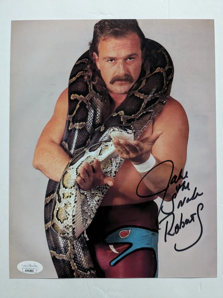 Foto firmada por JAKE THE SNAKE ROBERTS 8x10 WWF WWE lucha libre automática patio certificado de autenticidad JSA Foto 1 de 1