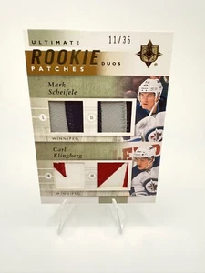 2011-12 Ultimate Patches Duos MARK SCHEIFELE & CARL KLINGBERG Dual Patches 11/35 - Picture 1 of 2