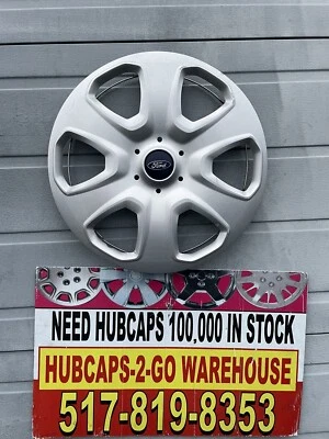 "Ford Focus 2012-2015 tapacubos OEM tapacubos 15"" CV6z1130A usado una tapa plateada 7058" Foto 1 de 4