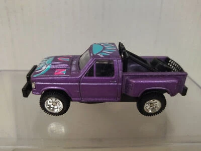 TOYOTA HILUX 4X4 PICKUP SUN PURPLE apx 1:64 MAISTO NO BOX - Imagen 1 de 4