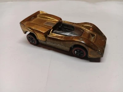 McLaren M6A 1968 Redline Hot Wheels dorado con interior negro fundición EE. UU. Foto 1 de 4