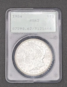 1904 Morgan Dollar | PCGS MS62 Rattler OGH - Picture 1 of 4