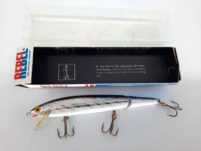 Rebel Floater Fishing Lure Box Marked J200 Jointed Silver Yellow Eyes VTG 4-1/2” - Image 1 of 4