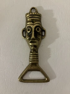 Abridor de botellas de latón pulido vintage vajilla étnica cabeza de hombre 4" - Imagen 1 de 3