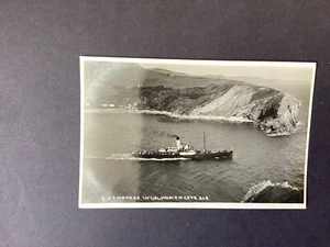 A beautiful vintage postcard of paddle steamer 'Empress' leaving Lulworth Cove. - Picture 1 of 7