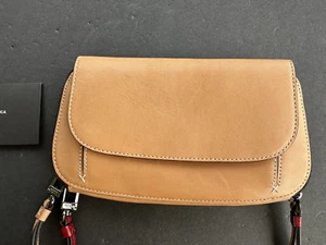 NUEVO CON ETIQUETAS TUMI Mujer Fraser Cremallera Alrededor Cuero Cartera Muñequera Bolso sin asas color Marrón - Imagen 1 de 8