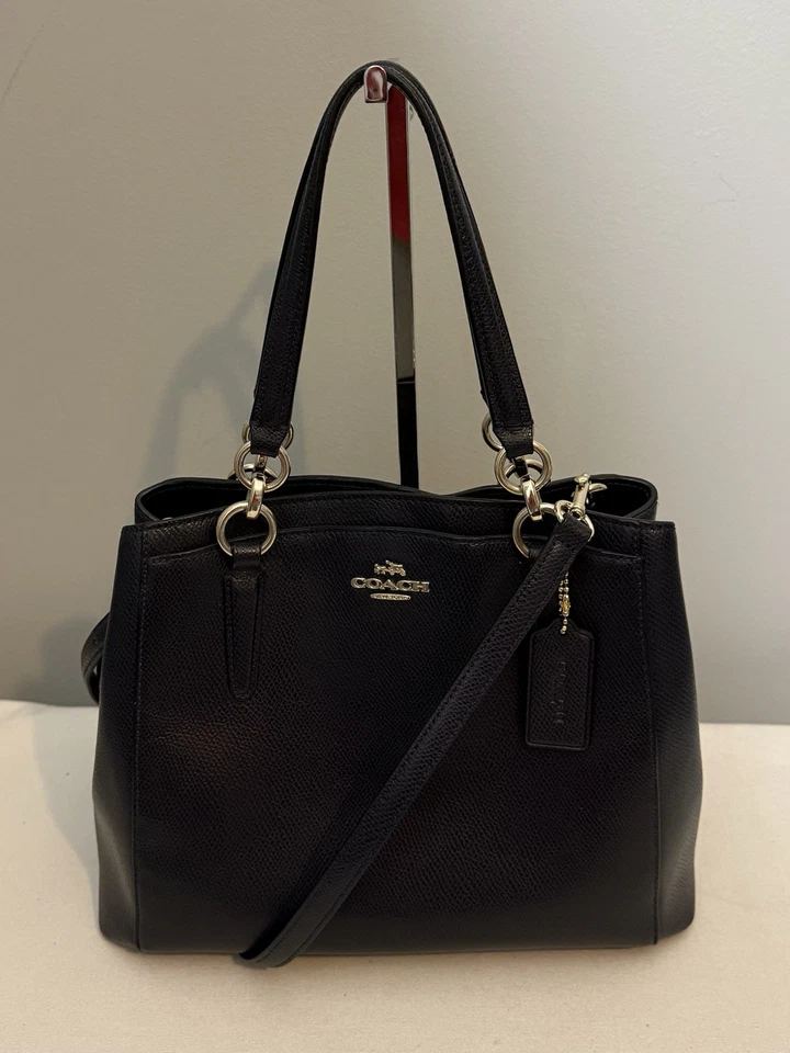 Bolso bandolera Coach Minetta de cuero azul medianoche F36642 Foto 1 de 4