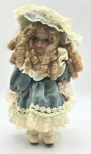 "Muñeca de porcelana de 11"" A Connoisseur Collection de Seymore Man" - Imagen 1 de 6