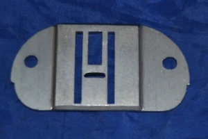 Parte de la placa de cubierta de alimentación de máquina de coser Singer #171138 táctil y de costura modelo 756 - Imagen 1 de 3