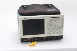 Tektronix CSA7404B Communications Signal Analyzer With 4M, JA2, ECTS, JAA Opts - Picture 1 of 9