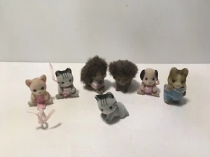 Calico Critters Sylvanian Families Twins Baby Lot of 7 Figures Hedgehog Cat Dog - Picture 1 of 8