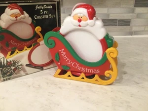 VINTAGE 1970 JOLLY SANTA CHRISTMAS 5 PIECES COASTERS & SLED SET NEW NIB - Picture 1 of 11