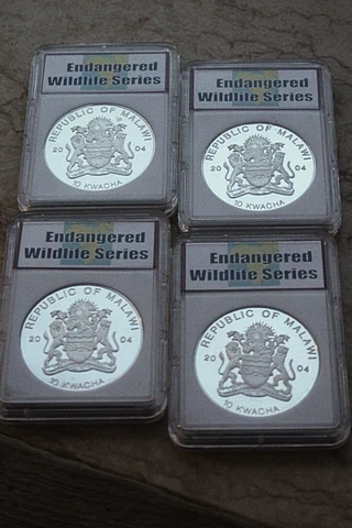 Lot of 4, 2004 Milawi Endangered wildlife series, 10 Kwacha Silver coins PR Cover