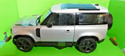 JLR Defender in Silver with Black Interior Welly Nex 1:24 th. Scale - Image 1 of 4