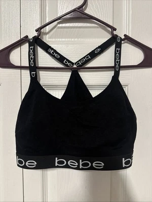 Sutiã esportivo feminino Bebe médio preto cruzado logotipo alças academia atlética - Imagem 1 de 4