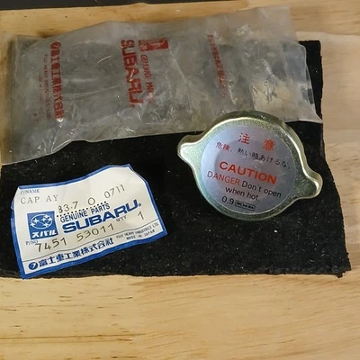 Tapa del radiador Impreza 1985-1993 Subaru GL DL GL10 NOS 745153011 OEM Foto 1 de 2