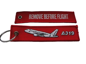 Schlüsselanhänger/Key-ring  REMOVE BEFORE FLIGHT  A 319  ca 12,5x3cm - Picture 1 of 1