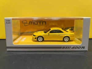 1/64 KYOSHO NISSAN NISMO 400 R WITH MOTN LED BASE COMPATIBLE YELLOW - Picture 1 of 2
