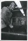 1969 Press Photo Leroy Kowalkowski Rinses Grease And Dirt From A Truck Part