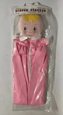Plakie Toys Doll Face Nursery Diaper Stacker Blonde Hair Blue Eyes Novelty Gift - Image 1 of 4