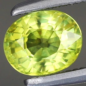 0,83ct 5,6x4,5mm ovaler natürlicher beheizter grünlichgelber Saphir-Songea, Tansania - Bild 1 von 4
