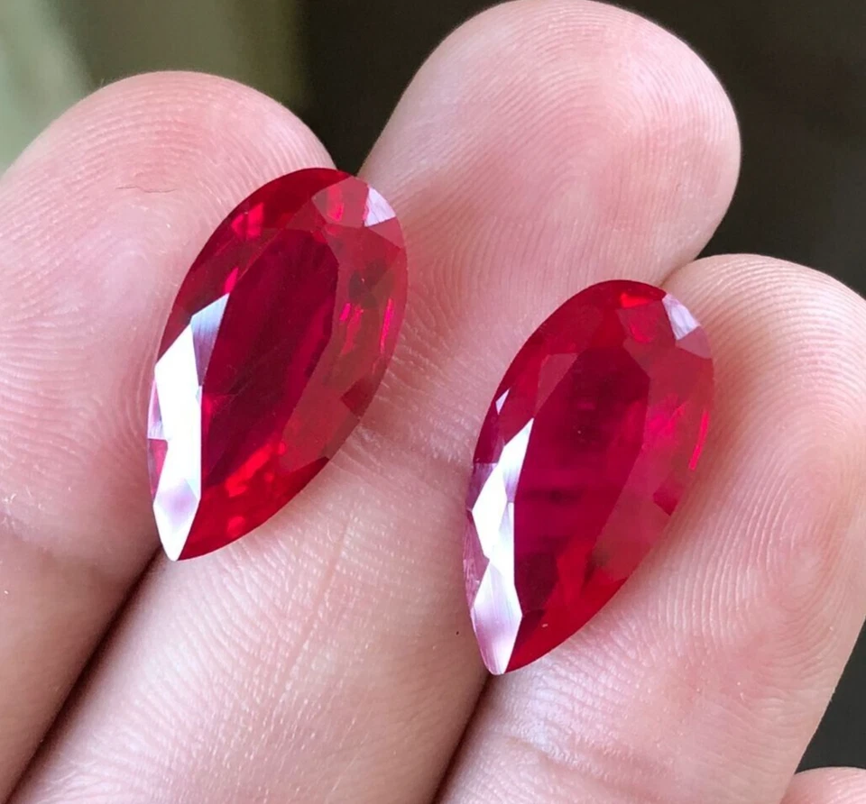 24.65 Cts Lab Created Pink Ruby Faceted 20x10x7 MM Pair Pear Shape Ruby Gemstone - Image 1 of 4