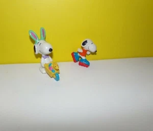 Snoopy Bunny Ears Woodstock Wheelbarrow Snoopy 2” Rollerblading PVC Figure - Picture 1 of 2