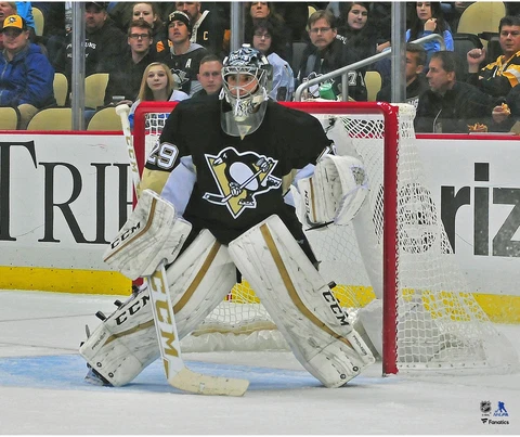 Marc-Andre Fleury Pittsburgh Penguins Unsigned Black Jersey in Net Photograph Cover
