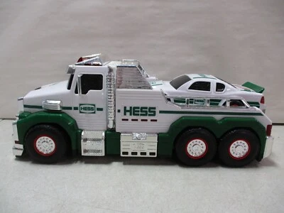 Camión de juguete Hess 2019 con auto de carreras 2011 Foto 1 de 4