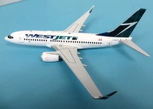 Gemini 200 GSWJA233 WestJet Boeing 737-700 Tartan Livery - Picture 1 of 12