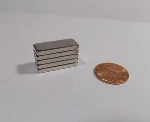 Lotto 5 magneti nuovi neodimio terre rare grado N52 blocco 25mm x 10mm x 3mm - Foto 1 di 1