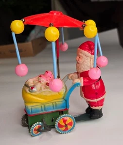 VTG Tin Litho Wind Up Santa Toy Celluloid Stroller Spinning Parasol Japan WORKS! - Picture 1 of 12