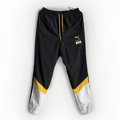 Pantalones deportivos PUMA x Helly Hansen a medida para hombre negros blancos amarillos Foto 1 de 4
