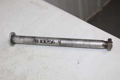1990 - 1992 Kawasaki KX250 OEM задняя ось с гайкой KX 125 250 KX500 90-04 91/4 - Изображение 1 из 2