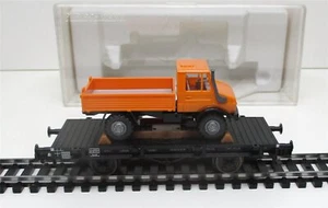 Escala H0 Fleischmann 5218K vagón plano con MB Unimog KKK EMBALAJE ORIGINAL (739K) - Imagen 1 de 1