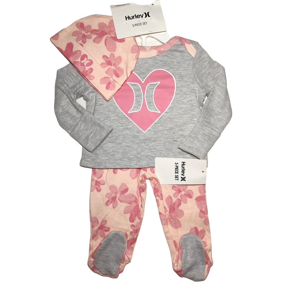 Conjunto de 3 piezas Hurley Bebé Niña Recién Nacido Rosa Gris Floral Corazón Pantalones Camisa Nuevo con Etiquetas Foto 1 de 2