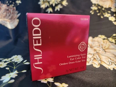  Trío de colores de ojos satinados iluminadores Shiseido, GD 804, GLO. 10524, 0,1 oz. Foto 1 de 4