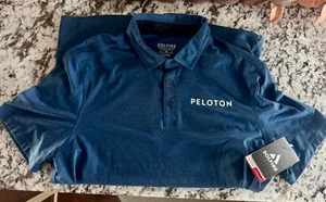 BNWT:  Solfire Peloton Men's Short Sleeve Polo Shirt Size L Blue - Picture 1 of 6