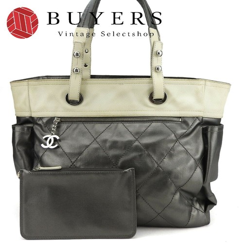 Borsa Chanel usata Paris Biarritz Gm rivestita tela argento avorio accessori con