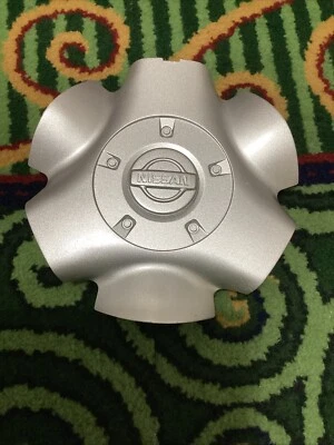 Tapa central Nissan Pathfinder 1999-2002 P/N 40342-2W600 1 pieza Foto 1 de 2