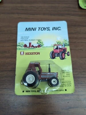 1/64 Mini Toys Hesston 130-90 Tractor 4wd With Duals  - Image 1 of 2