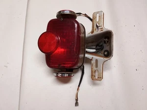 Suzuki RV125 taillight with bracket Fits 1972-1978 - Picture 1 of 2