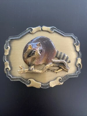 Hebilla de cinturón vintage 1977-1979 Raintree latón esmalte 3D mapache hecho en EE. UU. Foto 1 de 4